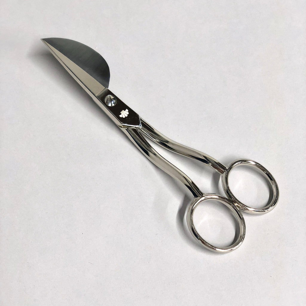Italian-made stainless steel candle wick trimmers.